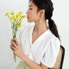 Camisa de gasa blanca y naranja para mujer
