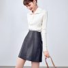 Faldas de cuero marrón para mujer