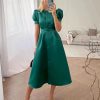 Vestidos de satén verde a la moda para mujer