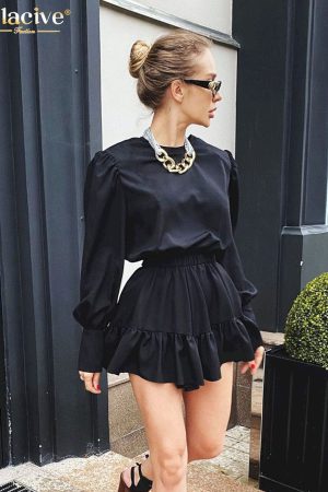 Vestidos elegantes negros de moda para mujer