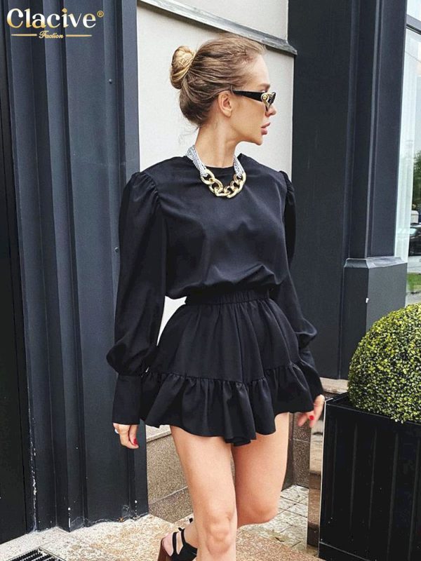Vestidos elegantes negros de moda para mujer